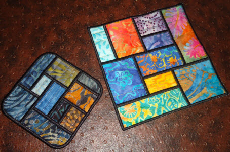 stained glass crumbs and scraps quilt in the hoop